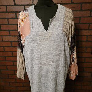 Kori Mixed Material top.  Knit top with rayon fabric sleeves.  Size Med.
